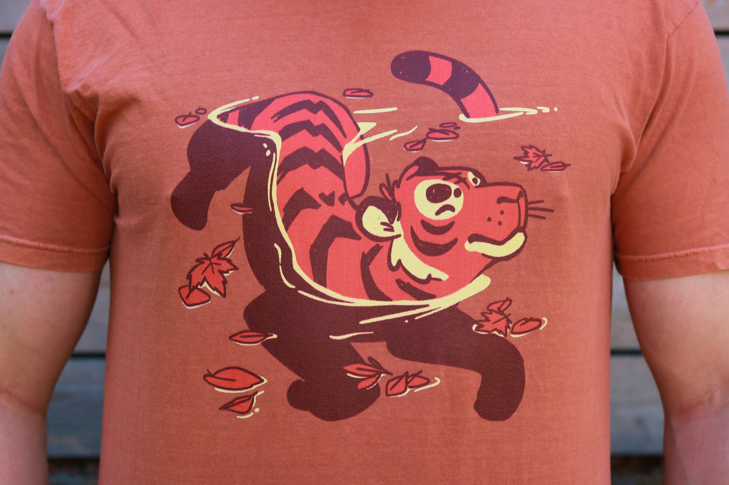 T-shirt with a tiger design on a yam background