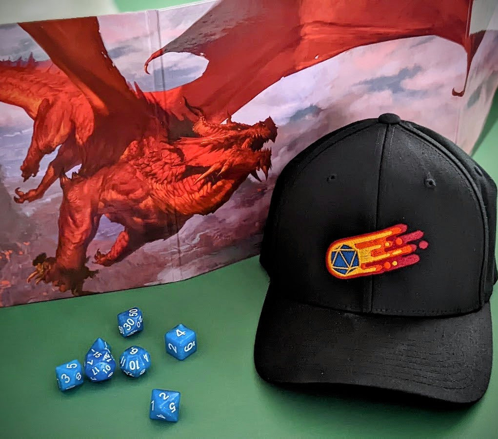 Black D20 flaming comet baseball hat in front of dungeons and dragons DM screen